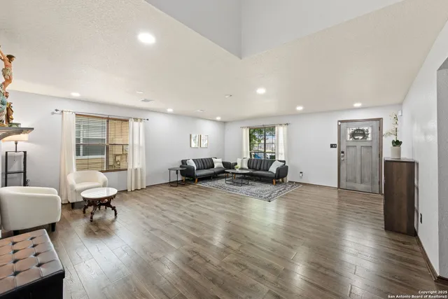 a view of a living room and dining room