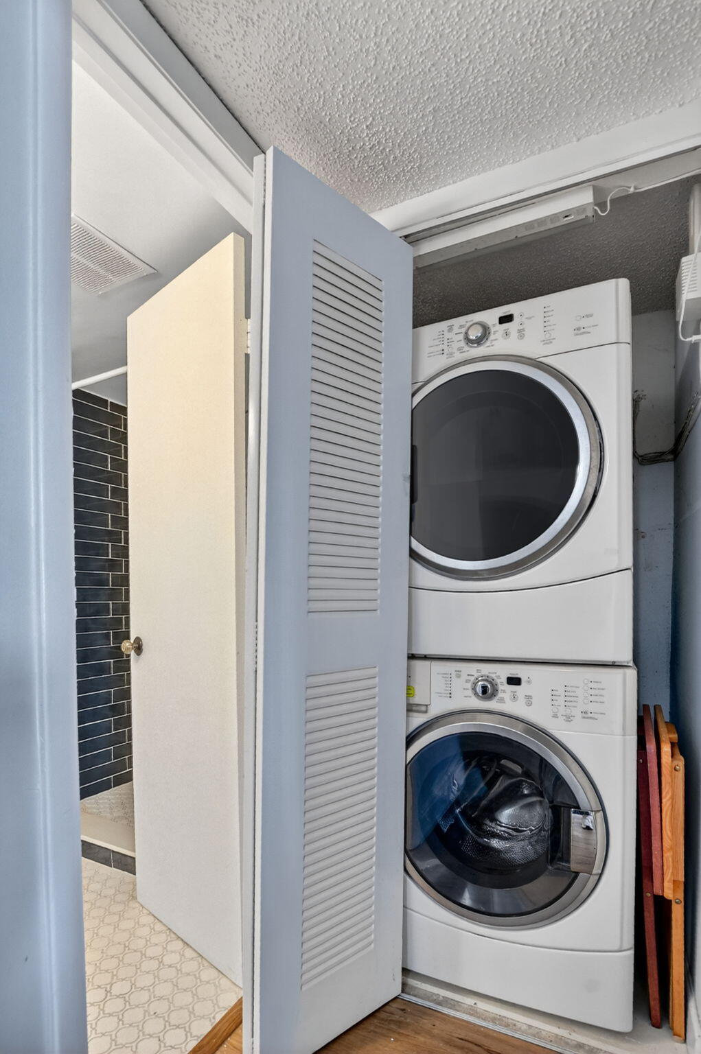 2297 Southwest 15th Street, Unit 127 Deerfield Beach, FL 33442 - Photo 24 of 39 a utility room with dryer and washer