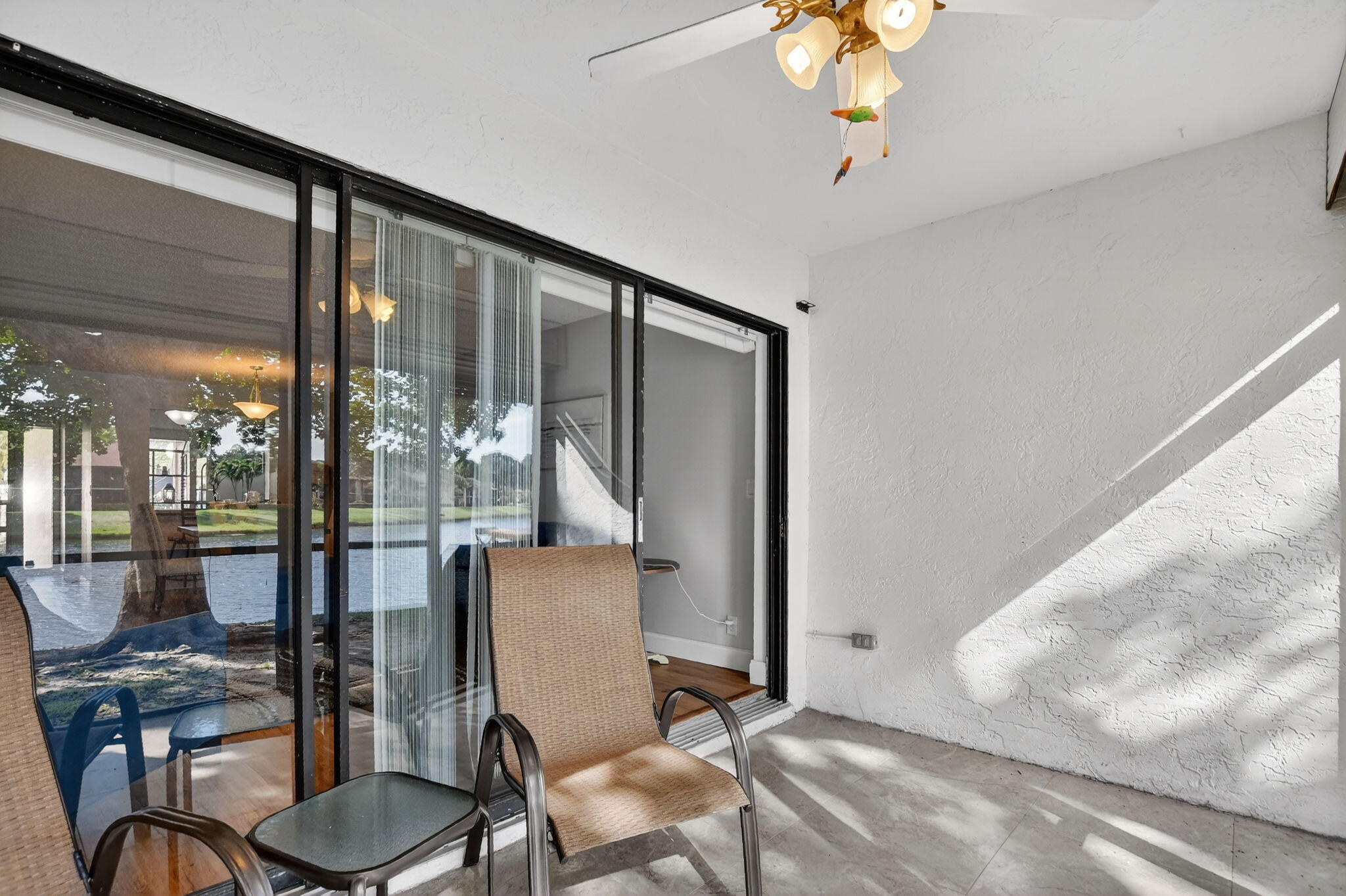 2297 Southwest 15th Street, Unit 127 Deerfield Beach, FL 33442 - Photo 27 of 39 a room with furniture and window