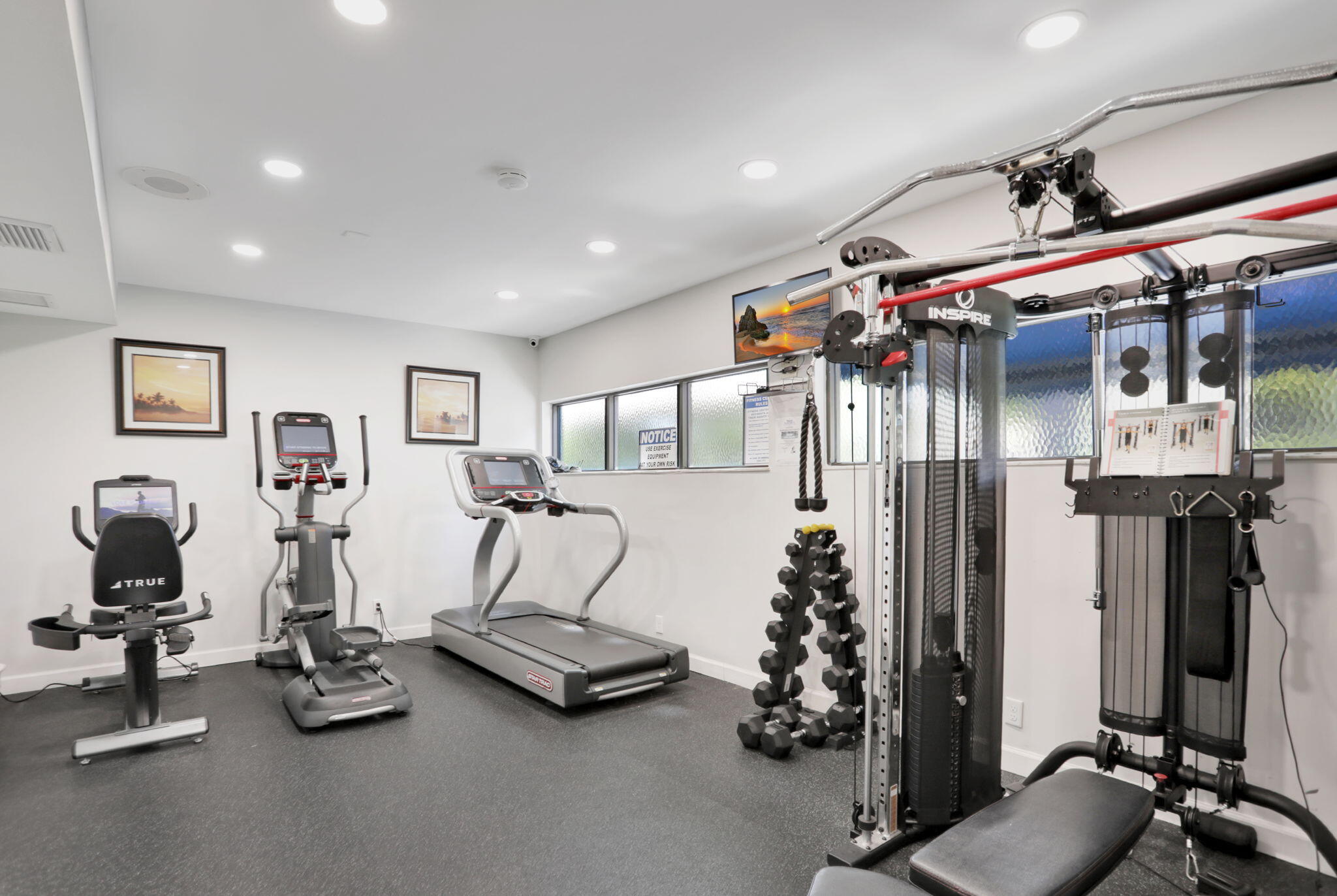 2297 Southwest 15th Street, Unit 127 Deerfield Beach, FL 33442 - Photo 36 of 39 a view of a room with gym equipment