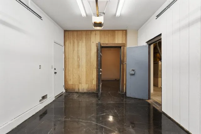 a view of a room with an entryway