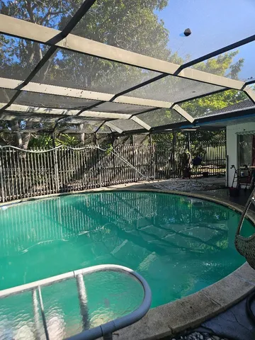 a view of a backyard with a garden
