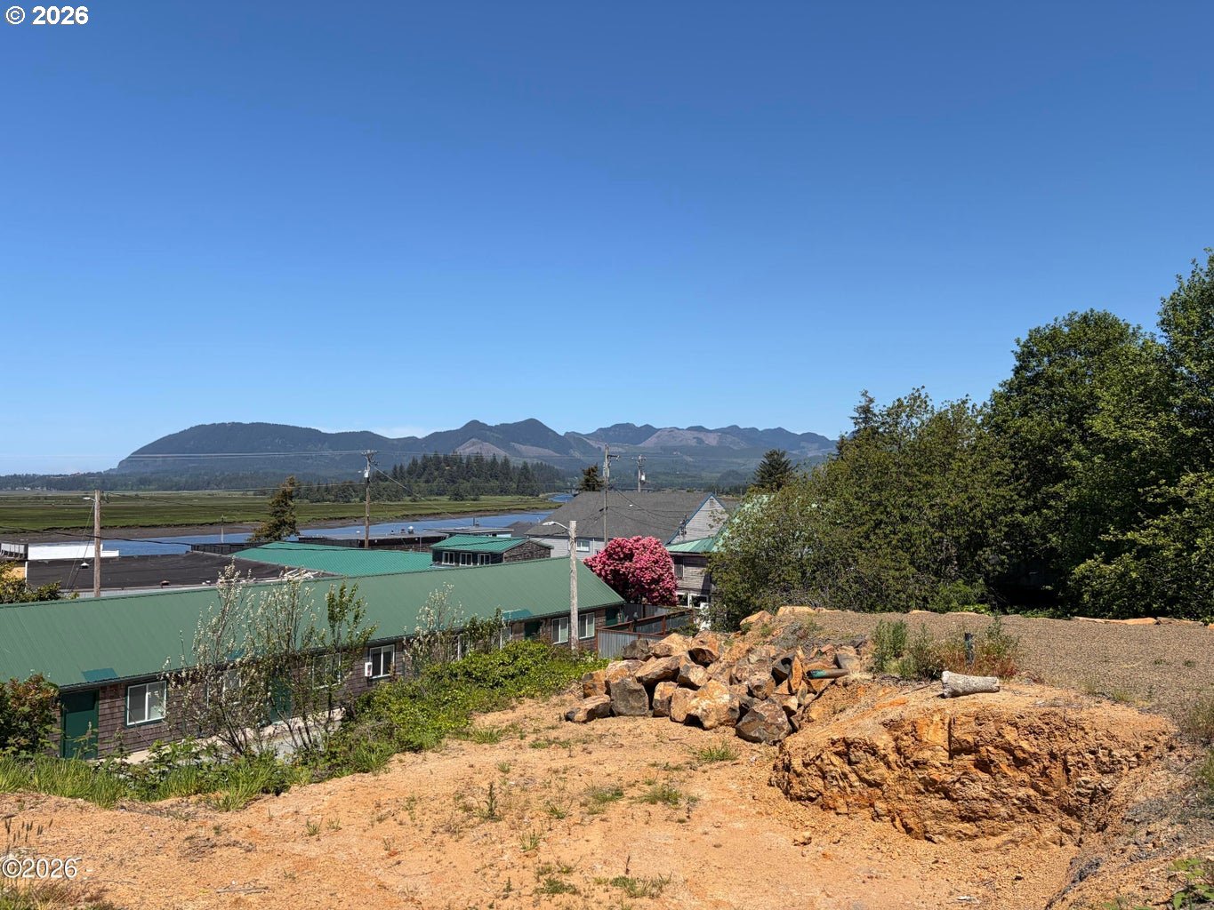 95 Gregory Street Wheeler, OR 97147 - Photo 8 of 20 a view of a lake with a mountain