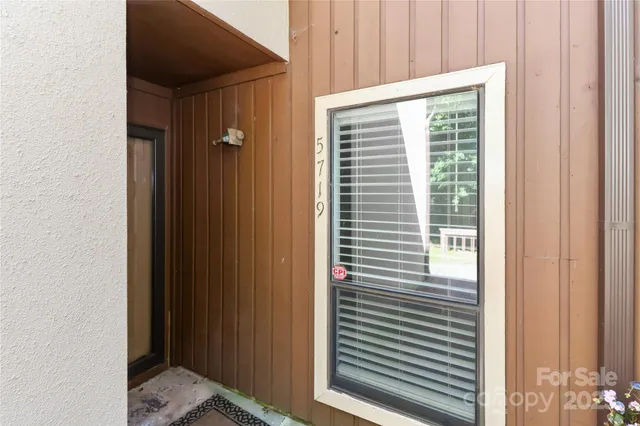 a view of a bedroom from a hallway