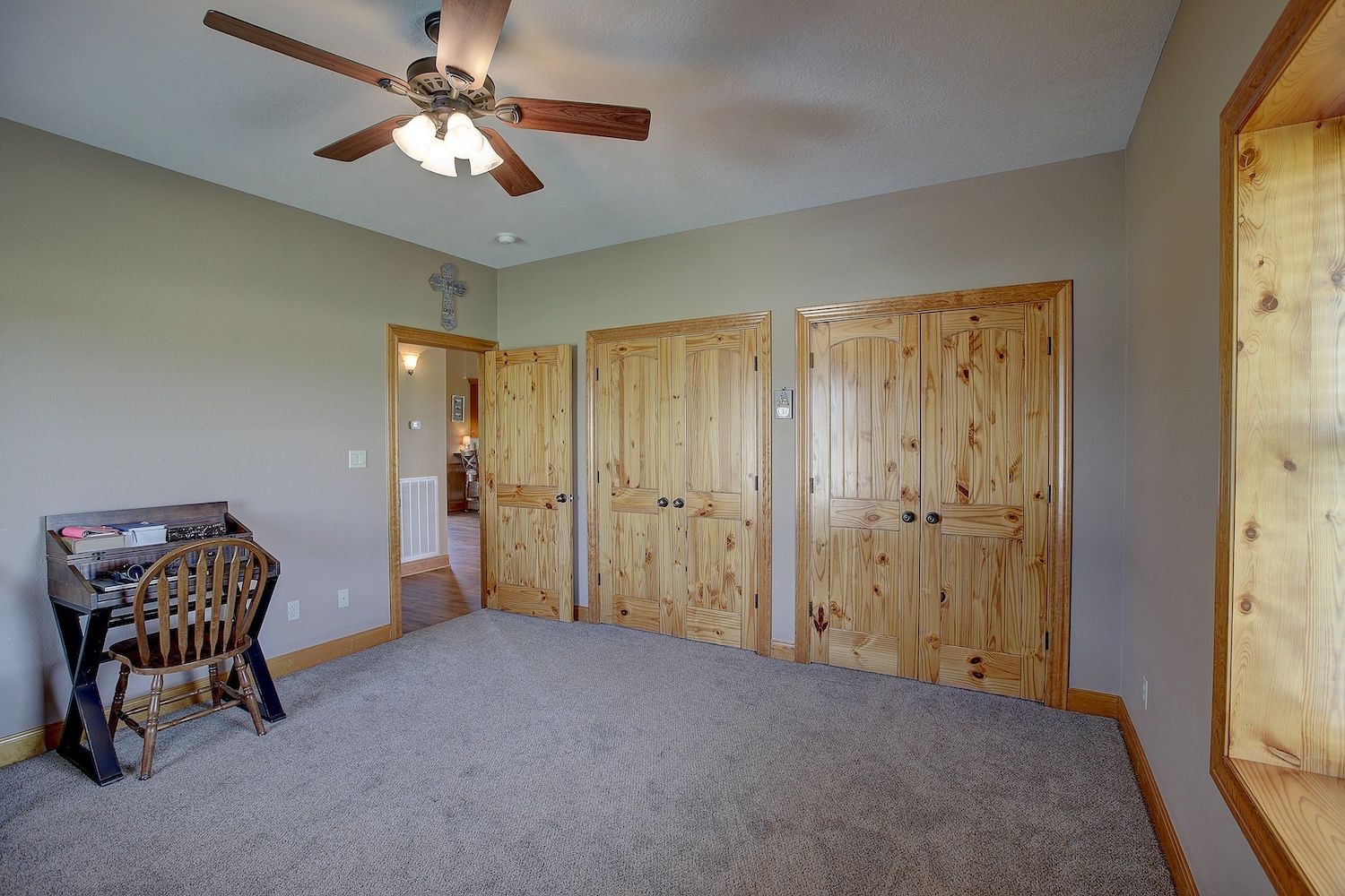 9414 Laird Road Round Top, TX 78954 - Photo 39 of 50 Bedroom 3 showing the double closet doors that are tastefully provided lots of light with carpet in both. Rooms, large and spacious Bedrooms