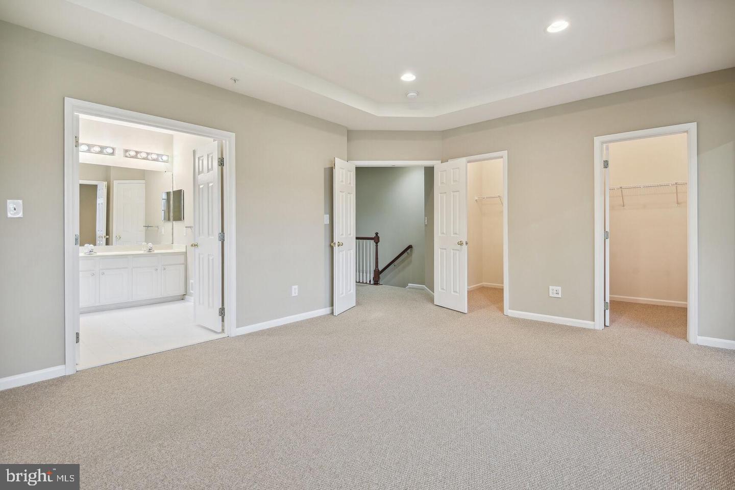 337 Main Street Gaithersburg, MD 20878 - Photo 22 of 35 an empty room with closet and a fireplace
