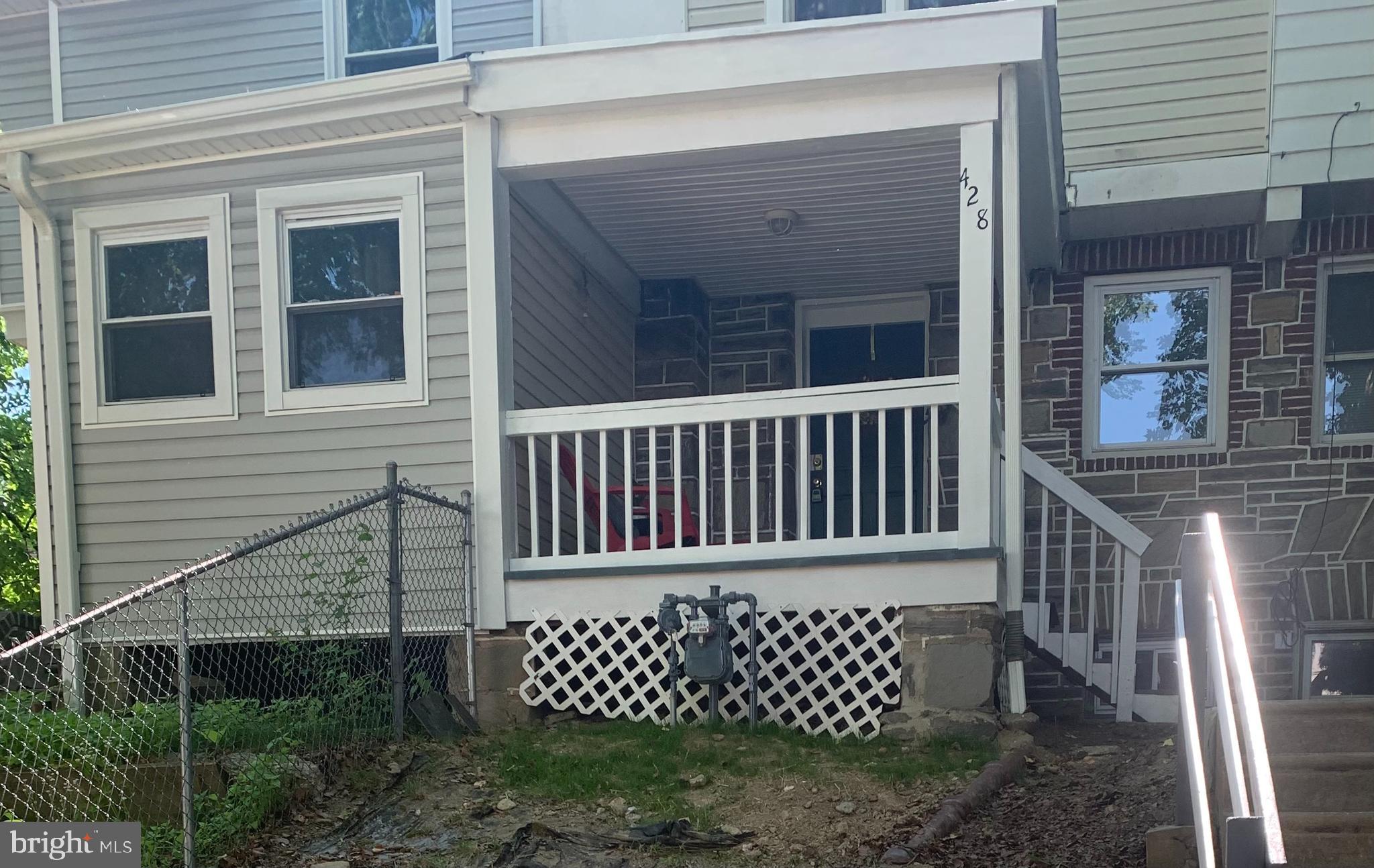 428 Croyden Road Upper Darby, PA 19082 - Photo 2 of 12 a view of a wooden house with a large window