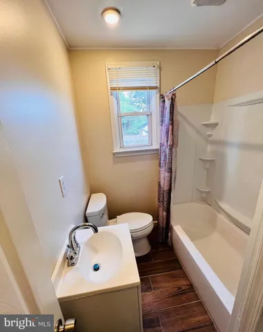 a bathroom with a sink and a bathtub