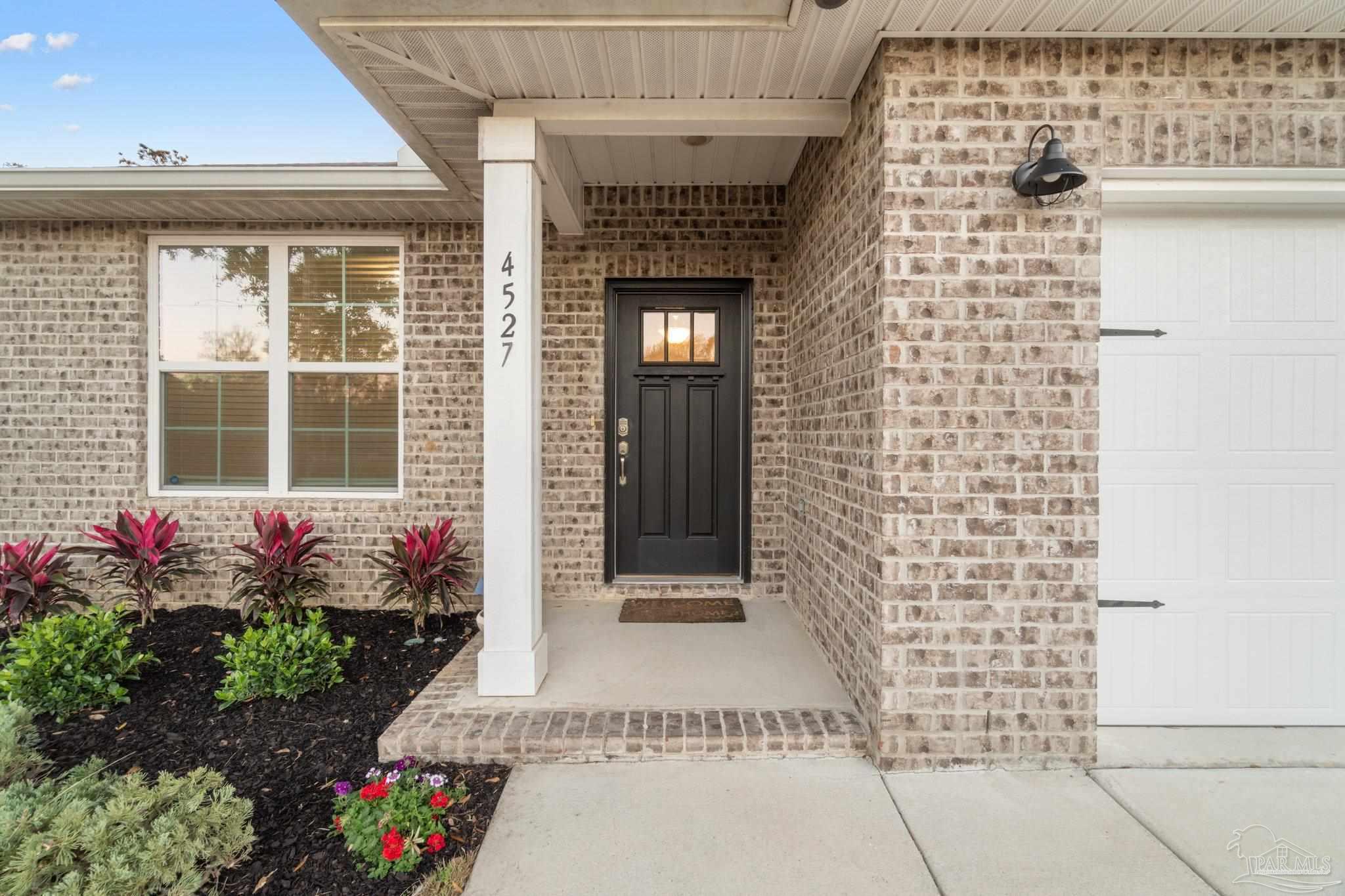 4527 Jude Way Pace, FL 32571 - Photo 3 of 38 a front view of a house