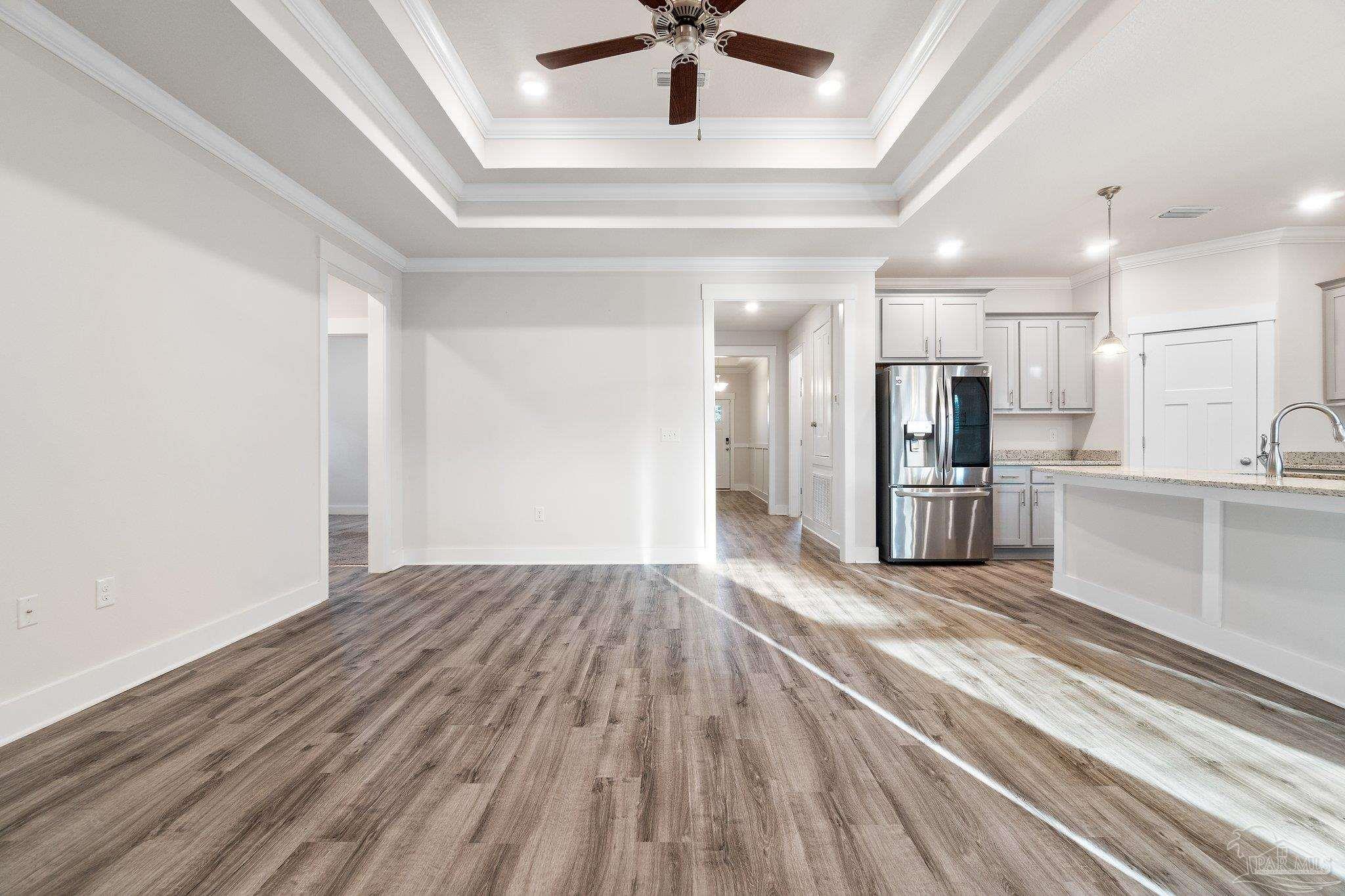 4527 Jude Way Pace, FL 32571 - Photo 7 of 38 a view of kitchen with sink and refrigerator