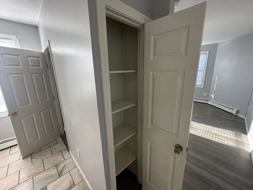 27 Willow Street, Unit A Lawrence, MA 01841 - Photo 20 of 29 a view of elevator with door