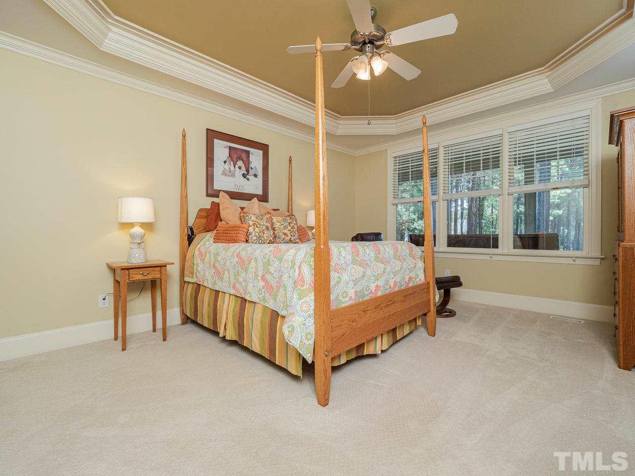 1217 Colonial Club Road Wake Forest, NC 27587 - Photo 13 of 30 Wake up to the endless golf course views from the first floor owner suite!