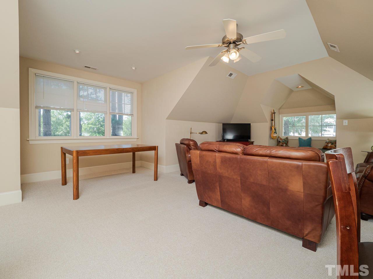 1217 Colonial Club Road Wake Forest, NC 27587 - Photo 23 of 30 More windows for sunshine and natural light. The door to the incredible walk-in storage is nearby too!