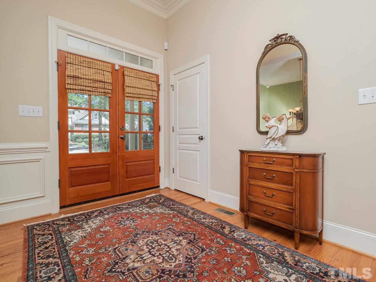 1217 Colonial Club Road Wake Forest, NC 27587 - Photo 5 of 30 Entrance foyer with upgraded double doors and a transom.
