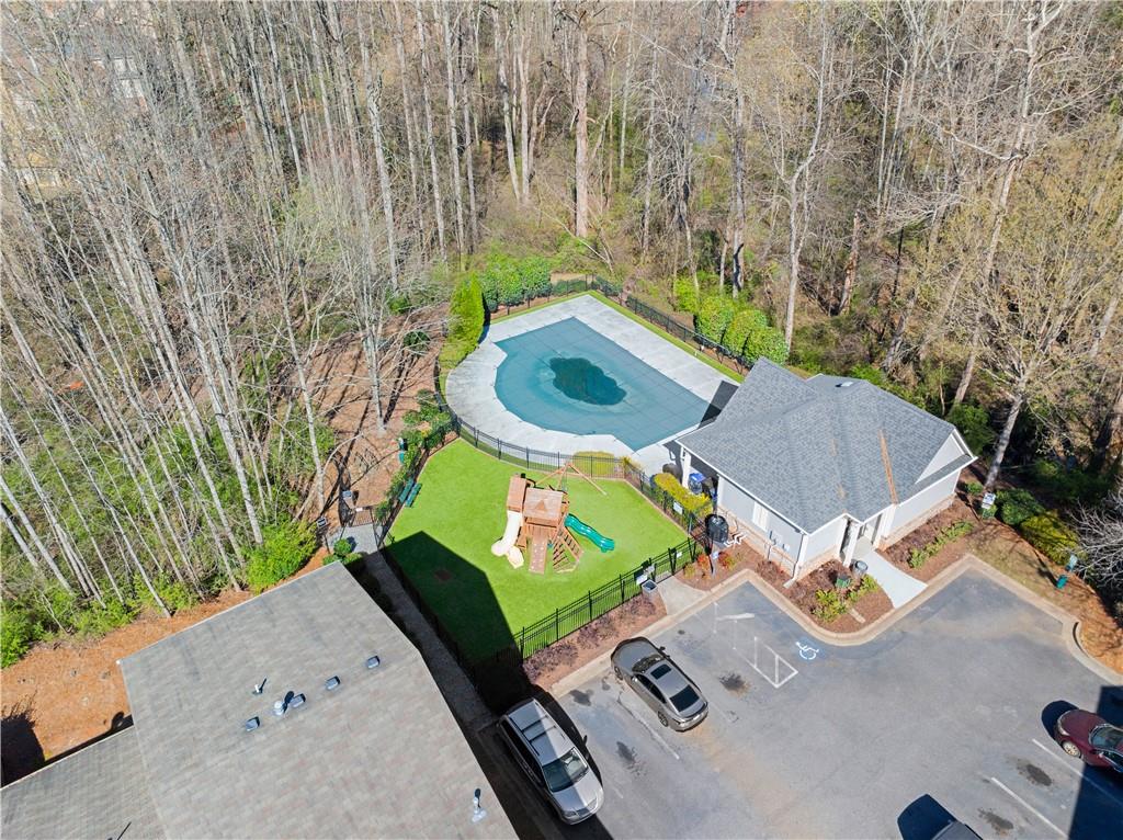 1203 Firethorne Pass Cumming, GA 30040 - Photo 31 of 37 an aerial view of a house with a swimming pool