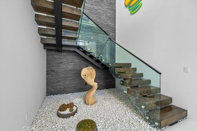 a view of a swimming pool from a balcony