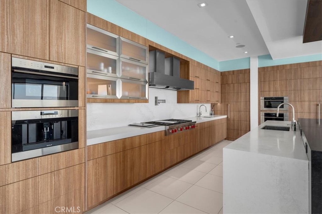 2935 Vista Del Mar Rancho Palos Verdes, CA 90275 - Photo 3 of 22 a large kitchen with stainless steel appliances granite countertop a stove and a sink