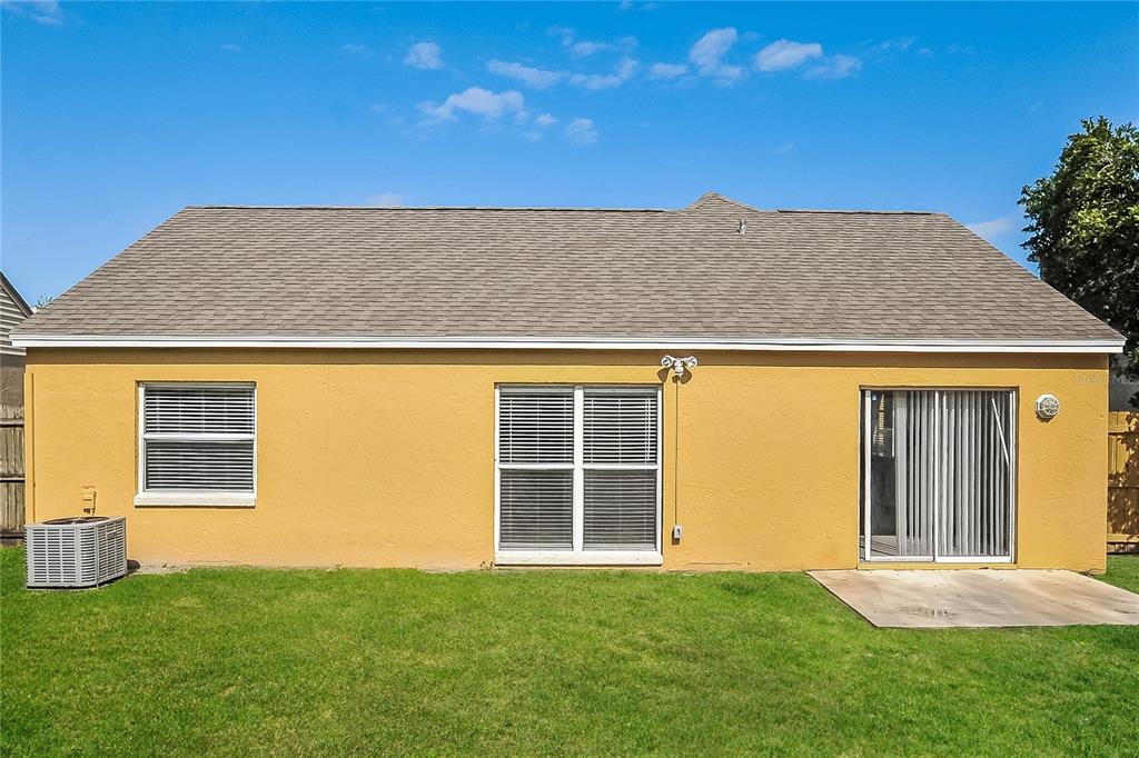 1625 Crossridge Drive Brandon, FL 33510 - Photo 15 of 16 a view of an house with backyard space and balcony