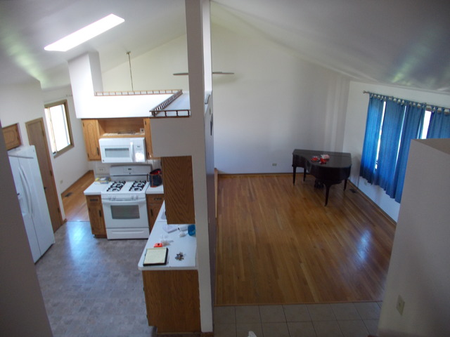 6200 Marsh Lane Matteson, IL 60443 - Photo 6 of 23 a living room with furniture and a fireplace