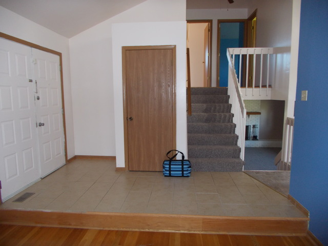 6200 Marsh Lane Matteson, IL 60443 - Photo 9 of 23 a view of an entryway with wooden floor