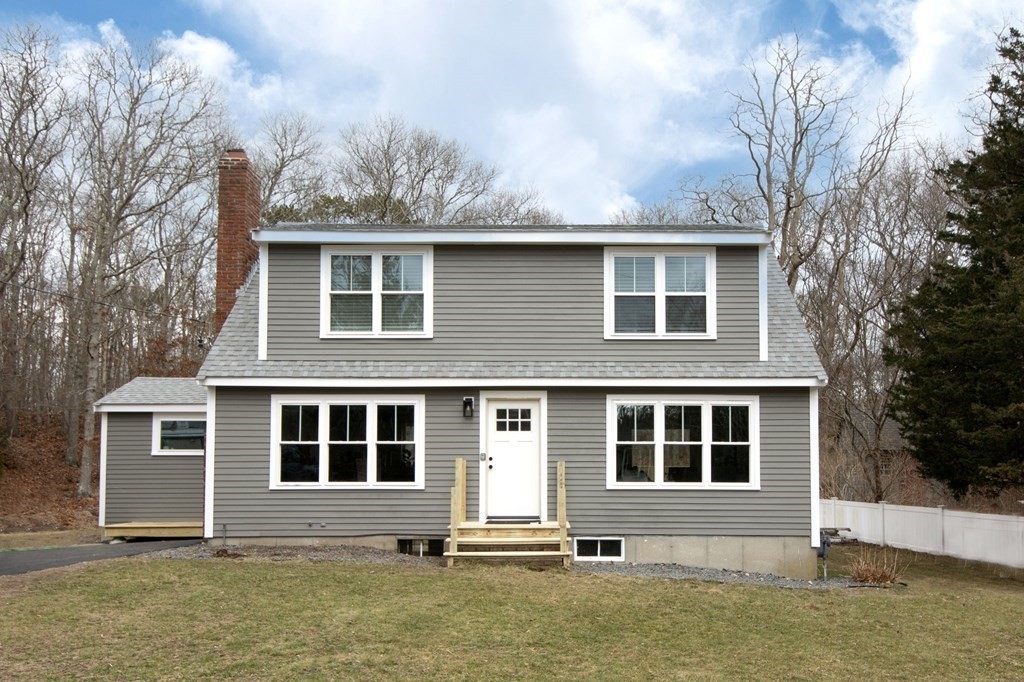 6 Seaview Road Bourne, MA 02562 - Photo 1 of 41 a front view of a house with a yard