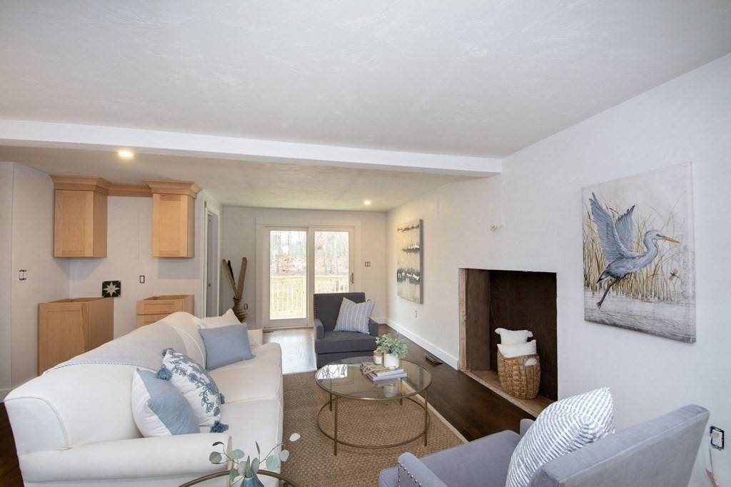 6 Seaview Road Bourne, MA 02562 - Photo 13 of 41 a living room with furniture and a couch