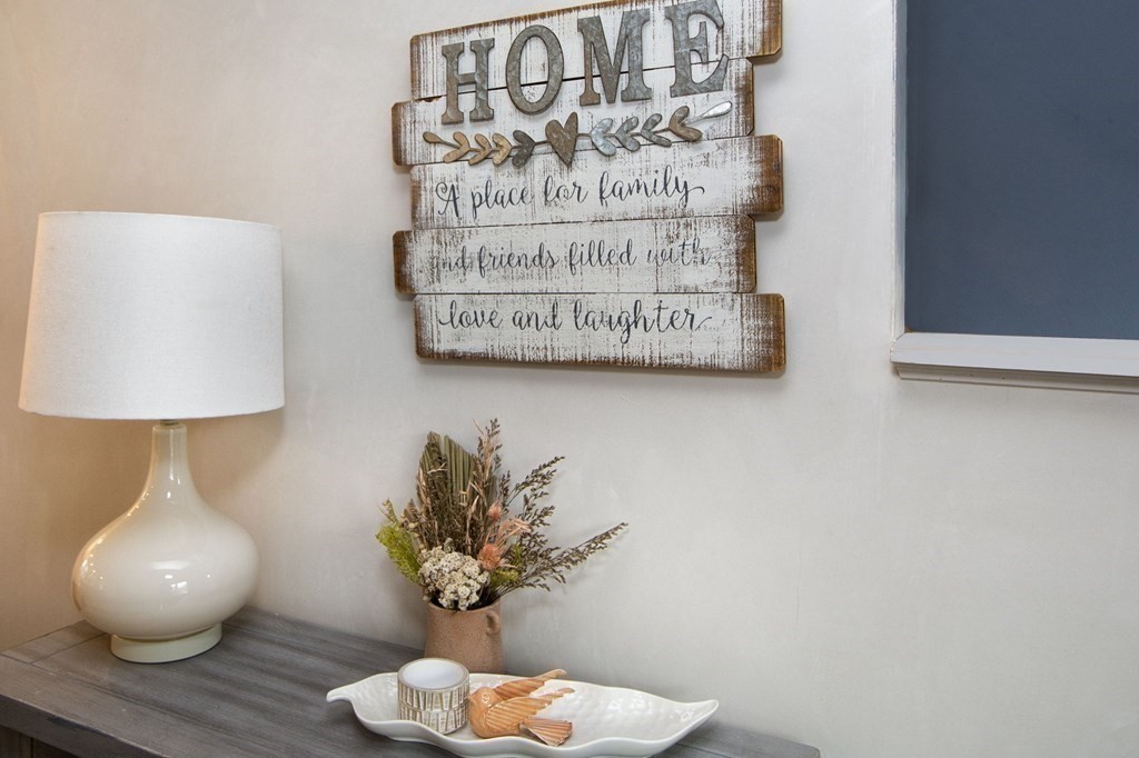 6 Seaview Road Bourne, MA 02562 - Photo 15 of 41 a vase of flowers sitting on a table