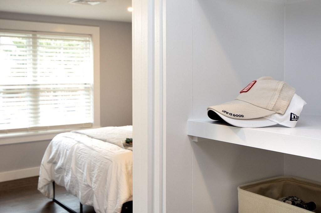 6 Seaview Road Bourne, MA 02562 - Photo 25 of 41 a bed sitting in a bedroom next to a window