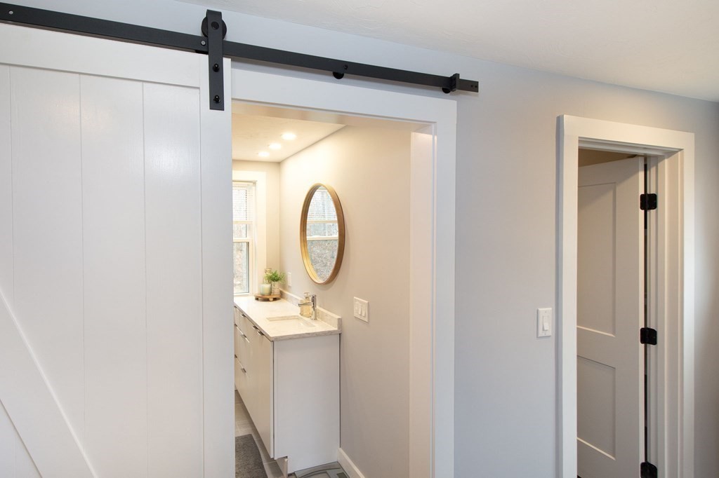 6 Seaview Road Bourne, MA 02562 - Photo 26 of 41 a bathroom with a shower and a window