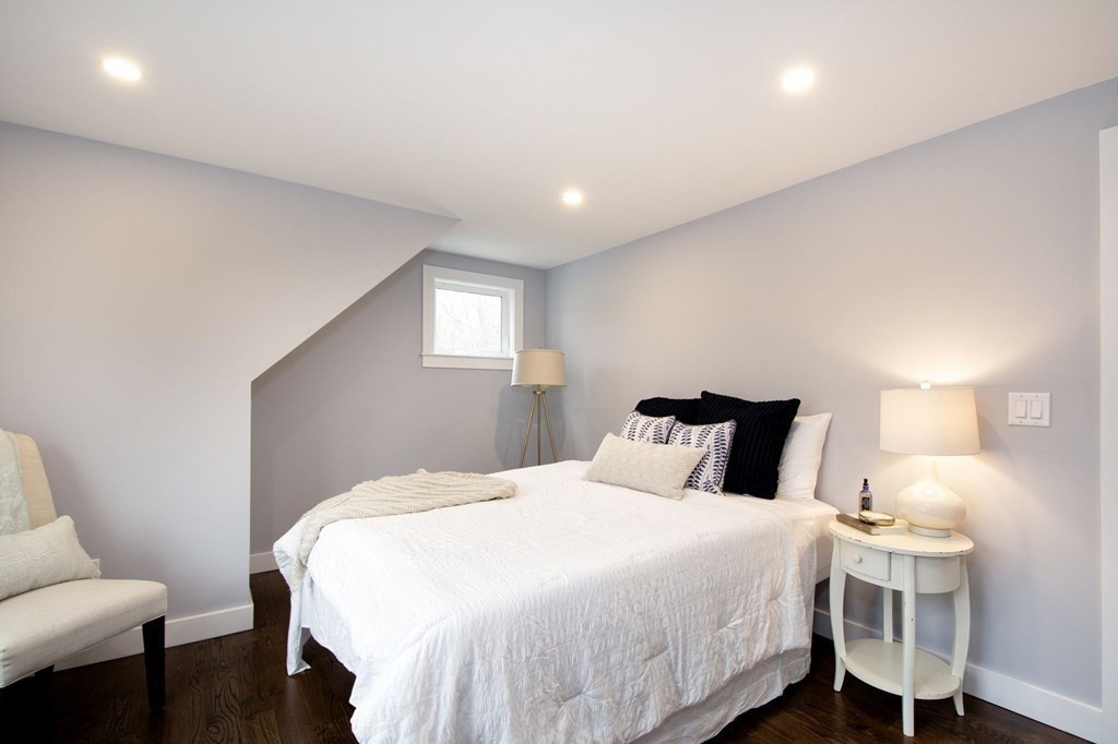 6 Seaview Road Bourne, MA 02562 - Photo 37 of 41 a bedroom with a bed and a lamp