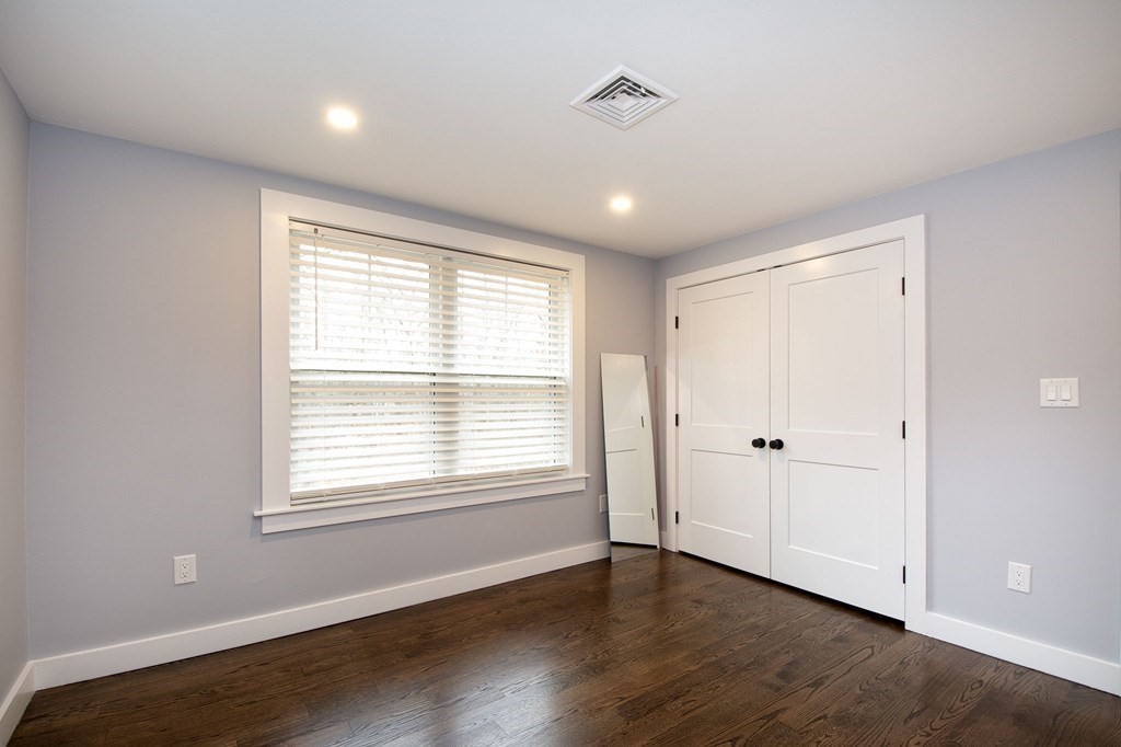 6 Seaview Road Bourne, MA 02562 - Photo 38 of 41 a view of an empty room with wooden floor and a window