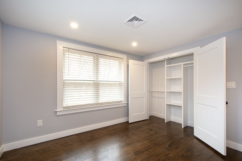 6 Seaview Road Bourne, MA 02562 - Photo 39 of 41 a view of an empty room with a window and wooden floor