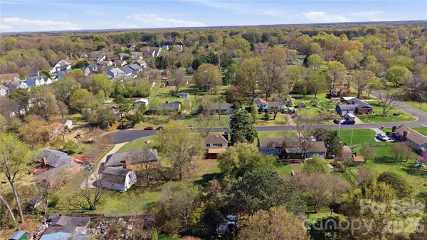 an aerial view of residential house with outdoor space