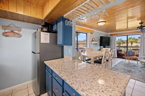 a living room with furniture window and wooden floor