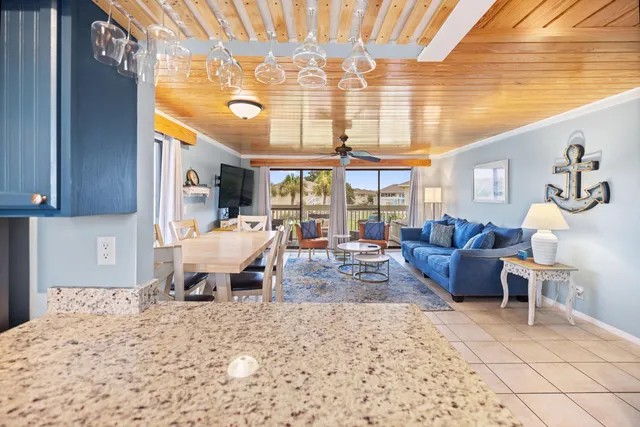 a living room with furniture and a table