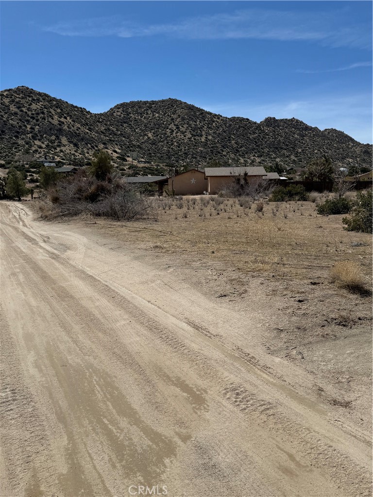 0 Minna Gombell Road Pioneertown, CA 92268 - Photo 14 of 17 a view of a lake with mountains in the background