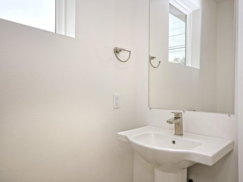1116 Atkinson Road Austin, TX 78752 - Photo 24 of 27 Bathroom with a sink
