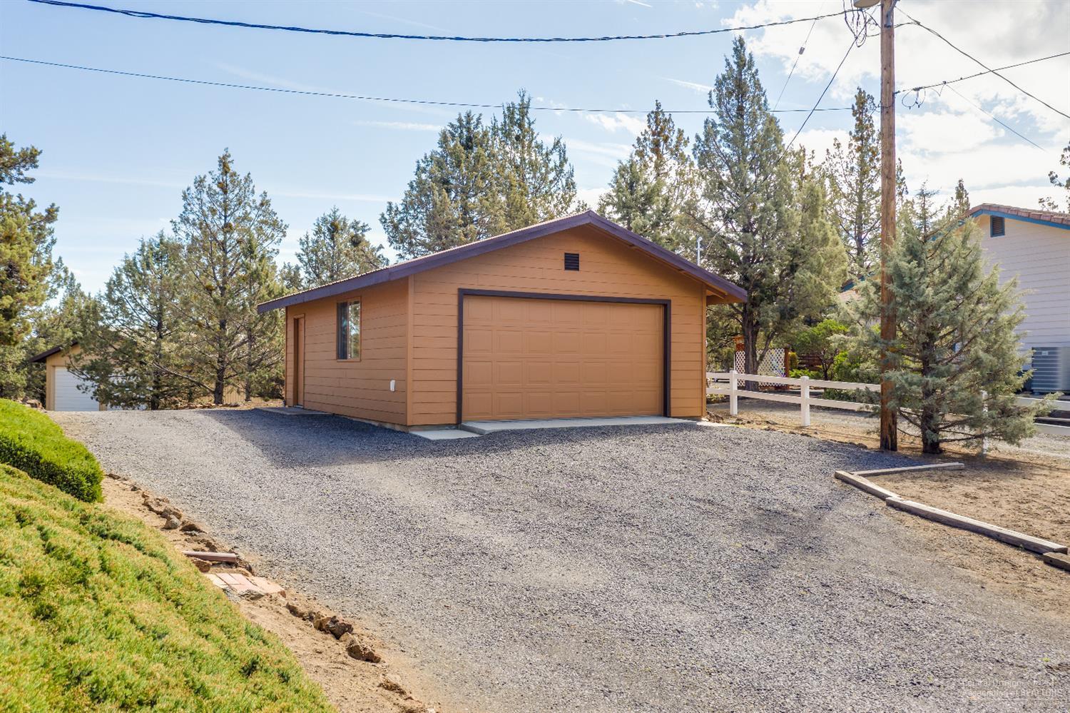 63236 Overtree Road Bend, OR 97701 - Photo 6 of 23 a view of a house with a outdoor space