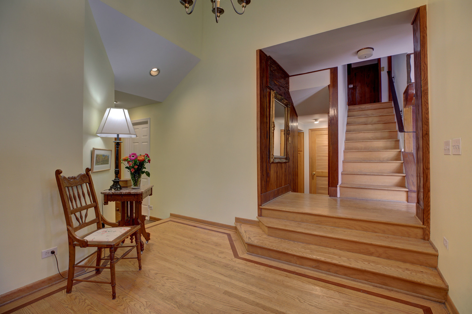 3150 Landwehr Road Northbrook, IL 60062 - Photo 11 of 43 a view of a hallway with wooden floor and stairs