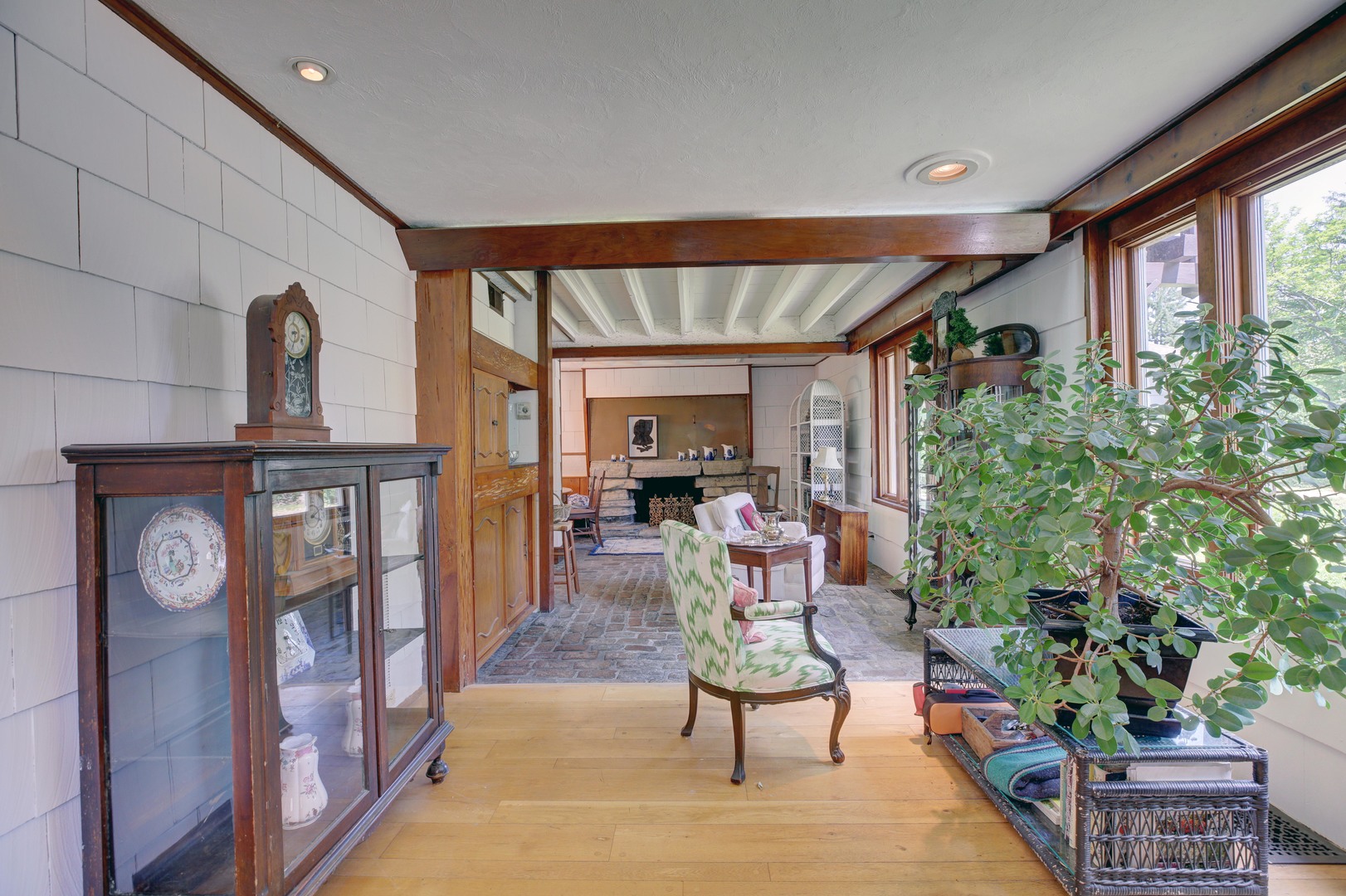 3150 Landwehr Road Northbrook, IL 60062 - Photo 13 of 43 a living room with furniture a potted plant and a large window