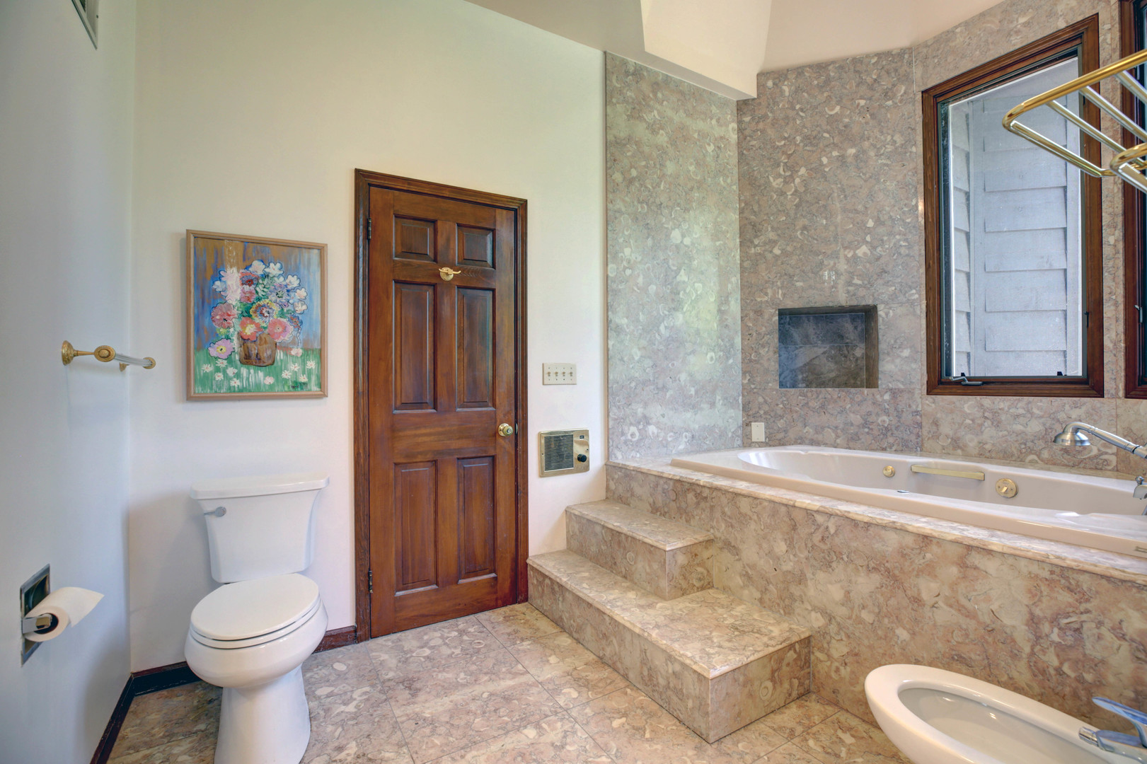 3150 Landwehr Road Northbrook, IL 60062 - Photo 22 of 43 a bathroom with a toilet sink and tub