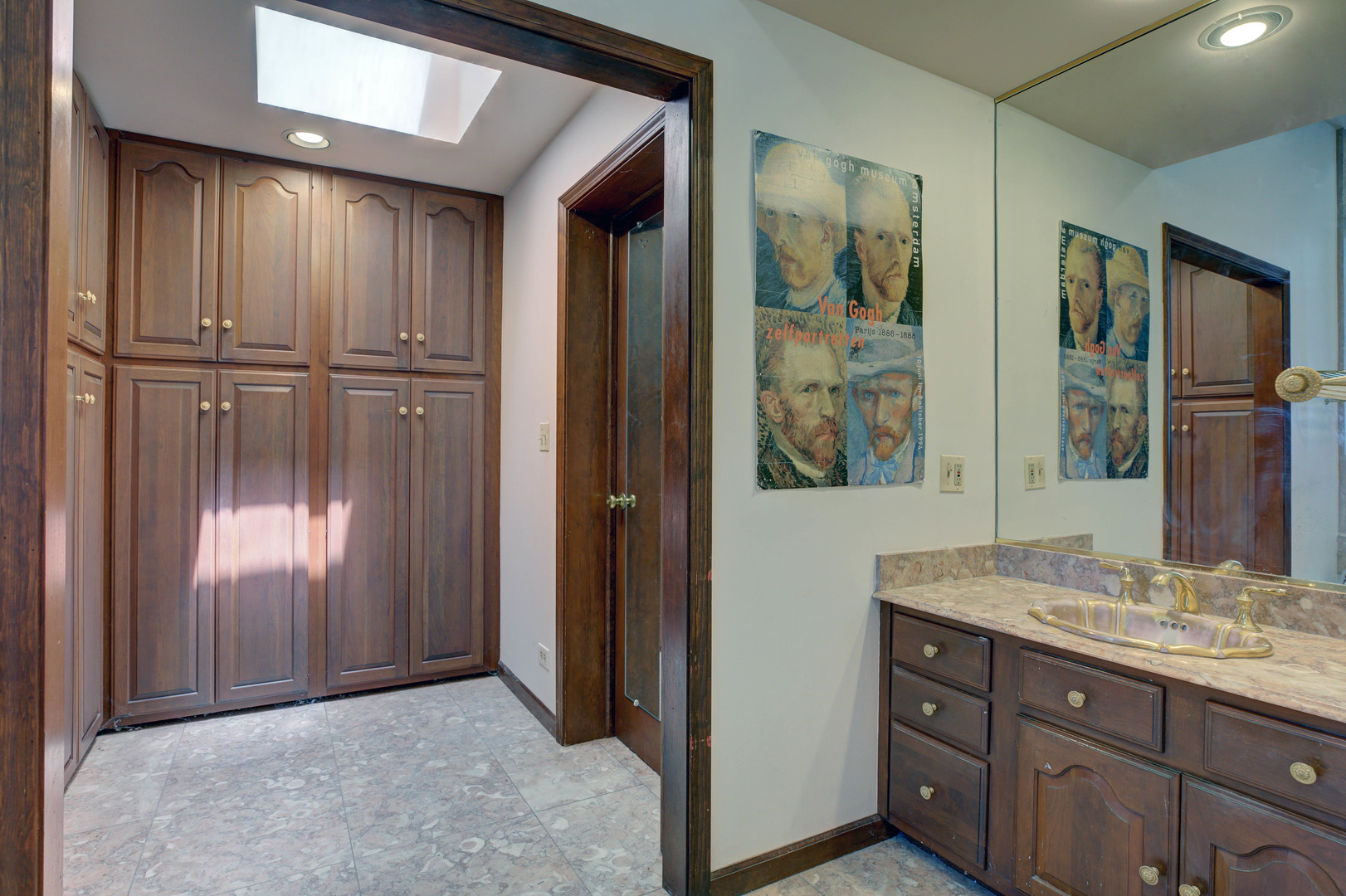 3150 Landwehr Road Northbrook, IL 60062 - Photo 24 of 43 a bathroom with a granite countertop sink mirror and vanity