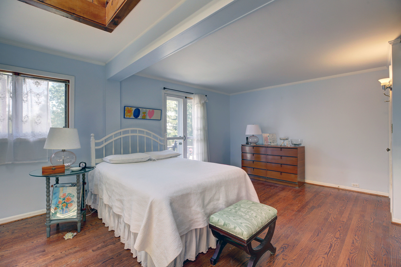 3150 Landwehr Road Northbrook, IL 60062 - Photo 27 of 43 a bedroom with a bed and wooden floor