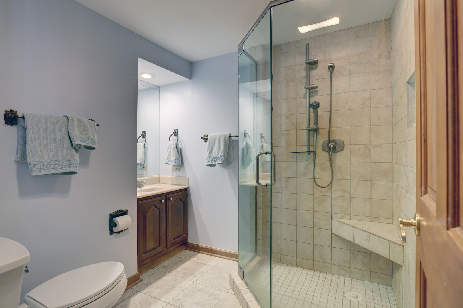 3150 Landwehr Road Northbrook, IL 60062 - Photo 28 of 43 a bathroom with a shower toilet and sink