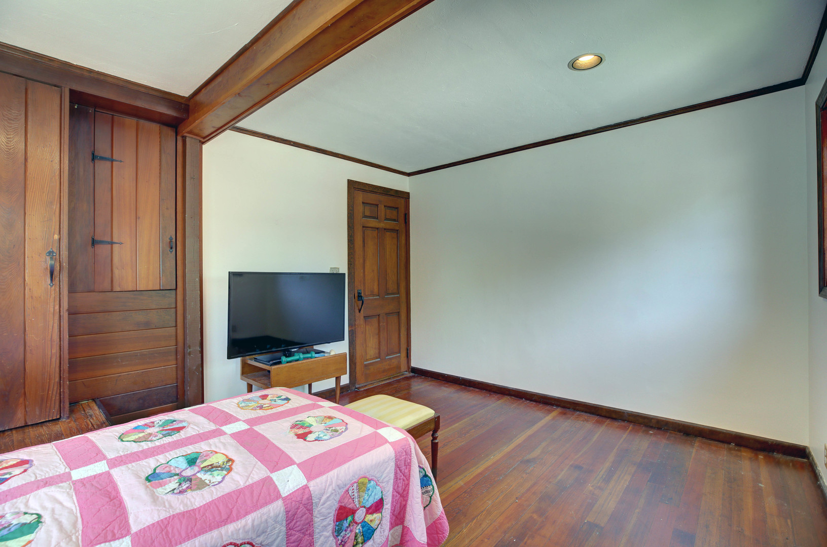 3150 Landwehr Road Northbrook, IL 60062 - Photo 30 of 43 a bedroom with a bed and a flat screen tv