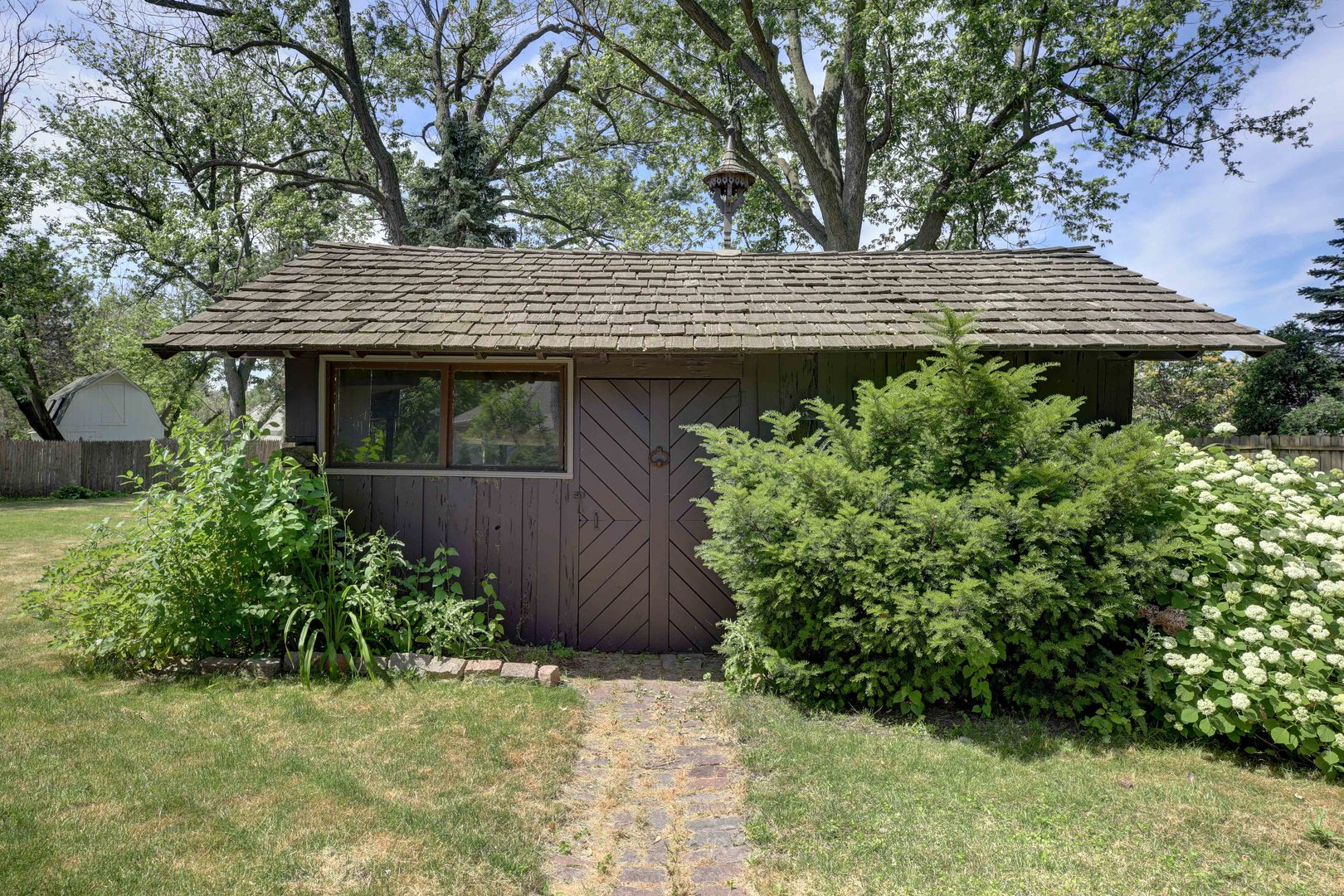 3150 Landwehr Road Northbrook, IL 60062 - Photo 7 of 43 a view of a backyard with plants