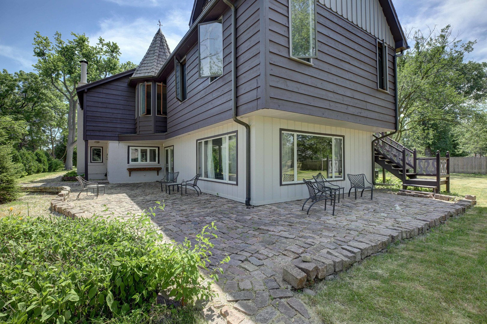 3150 Landwehr Road Northbrook, IL 60062 - Photo 8 of 43 a view of a house with a yard and sitting area