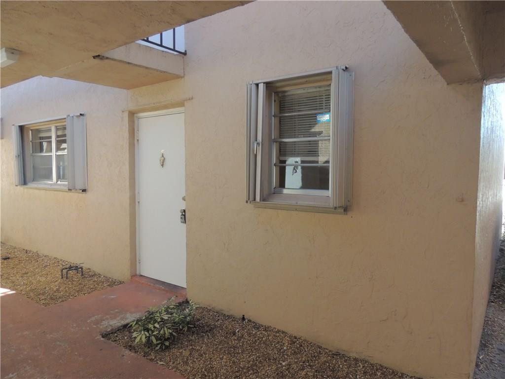 600 Southwest 2nd Avenue, Unit 143 Boca Raton, FL 33432 - Photo 2 of 14 a view of an empty room with windows