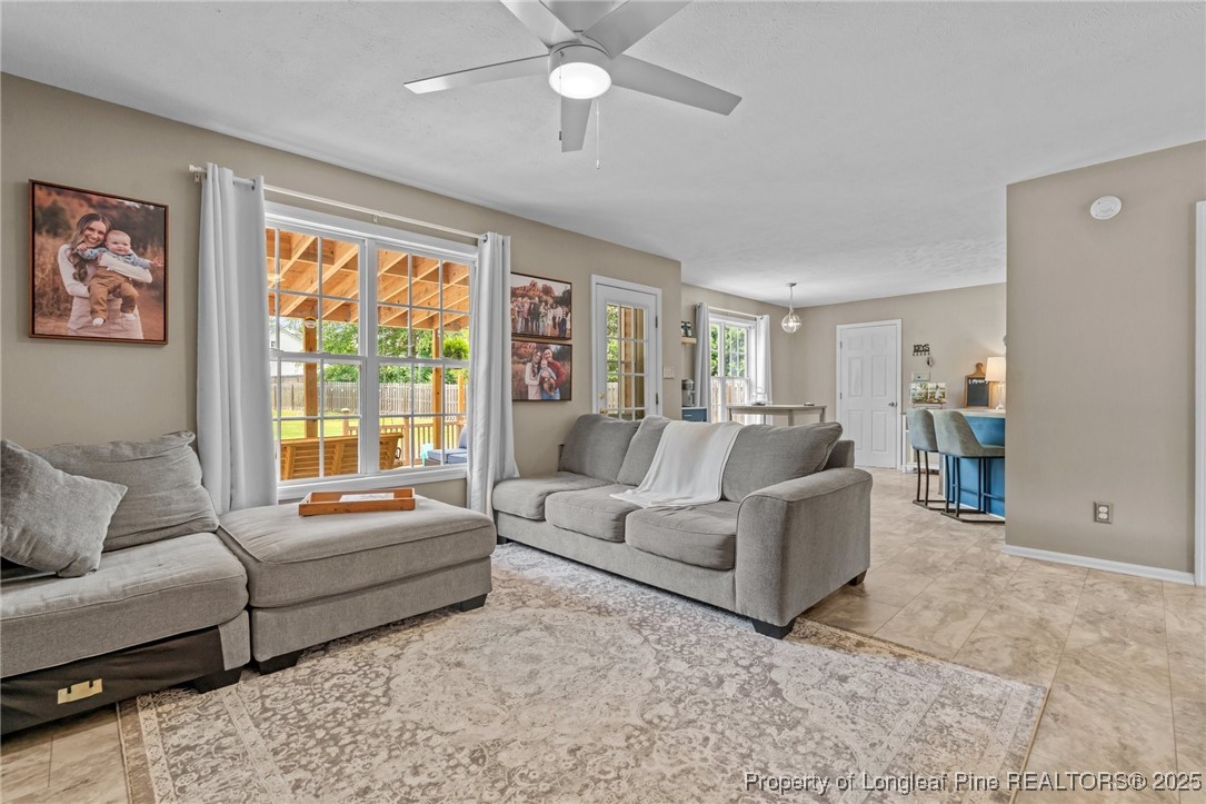 383 Yorkshire Drive Cameron, NC 28326 - Photo 14 of 49 a living room with furniture and a large window