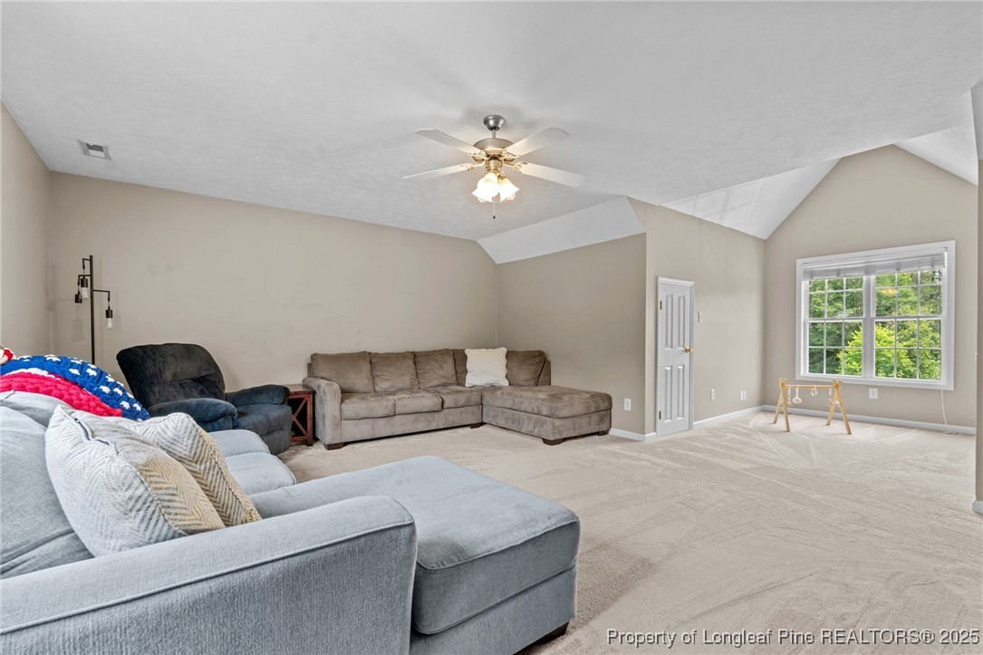 383 Yorkshire Drive Cameron, NC 28326 - Photo 33 of 49 a living room with furniture and a ceiling fan